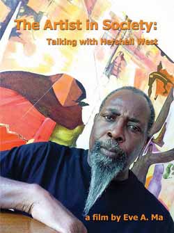artist Hwrshell West in front of one of his paintings