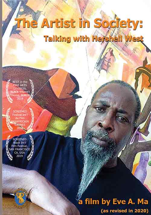 artist Hershell West in front of one of his paintings
