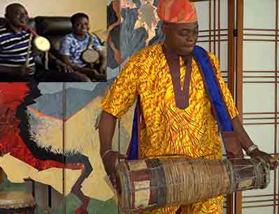 Rasaki Aladokun with batá drum (and in corner, with his youngest son